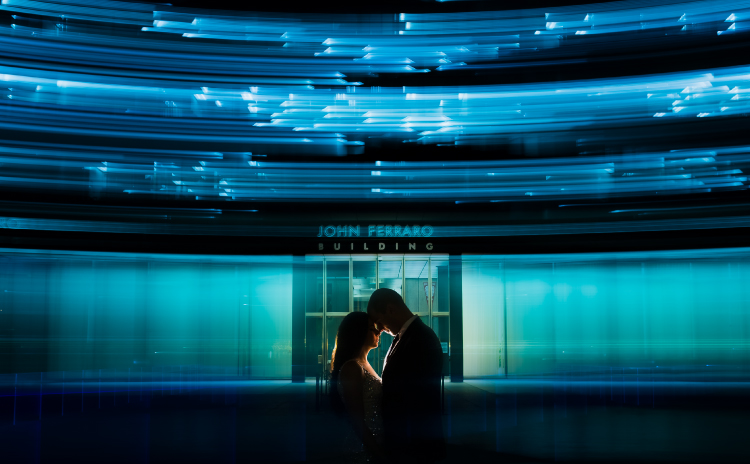 a couple surrounded by light trails. Used to demonstrate the creative effects of flash duration.