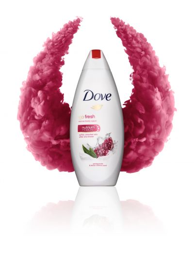 bottle of Dove body wash surrounded by wings. Demonstrating photographing slower moving objects.