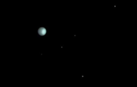 The Outer Reaches © Martin Lewis (UK) - RUNNER-UP
On 3 December 2019, the cloud cleared around mid-evening to reveal exceptionally steady skies over the photographer’s home in the UK. Making the most of the conditions, he turned his telescope to the distant planet Uranus and started gathering video frames using an infrared filter to bring out cloud details on this otherwise visually bland planet. To get the best images, a photographer must average the best of many short exposures. For an object as faint as Uranus, this means the individual frames are very noisy. That night, even through these noisy preview frames, the lighter polar region could be easily seen – a most exceptional situation and a testament to the steady skies that night.
Home-built 444 mm Dobsonian Newtonian reflector telescope at f/12.1, Astronomik 610 nm filter, Home-built Equatorial tracking platform mount, ZWO ASI290MM camera
Uranus: 13,500 x 8.6-millisecond exposures
Moons: 1,170 x 100-millisecond exposures